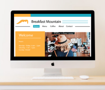 Layout image of the Breakfast Mountain website on a desktop