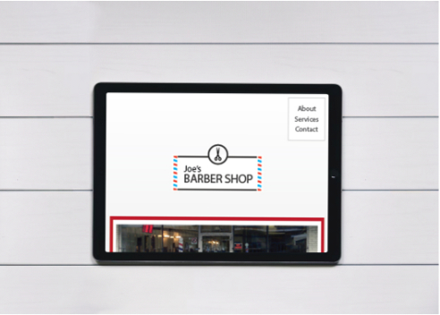 Layout image of Joe's Barbershop website on a tablet