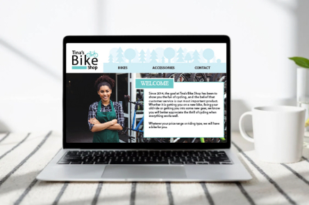 Layout image of Tina's Bike Shop website on a laptop