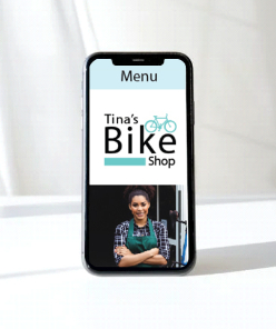 Layout image of Tina's Bike Shop website on a phone